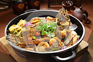 Hot pot fish sea bass with chilly onion