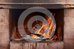 Hot red charcoals in bonefire