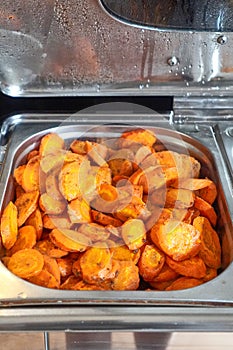 Hot roasted potatoes with golden crispy texture