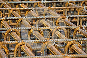 Hot rolled deformed steel bars or steel reinforcement bar.