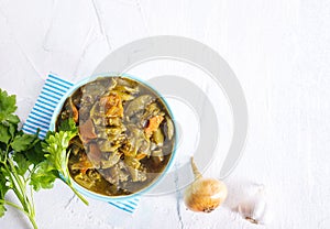 hot salad with green tomato and spices