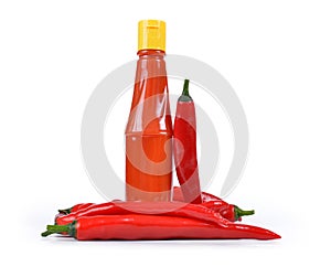 Hot sauce in bottle with Red chili pepper