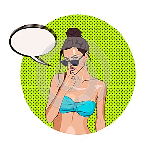 Hot tanned girl with speechbubble for your text photo