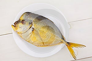 Hot smoked Moonfish fish on white