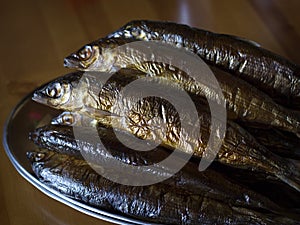 Hot smoked Omul (endemic species of fish in the lake Baikal, Russia).