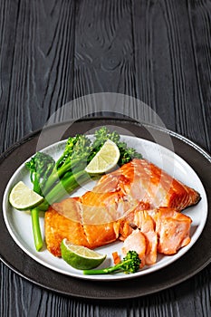 hot smoked salmon with cooked broccoli and lime