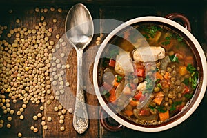 Hot soup with green lentil, chicken, vegetables and spices.