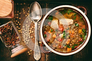 Hot soup with green lentil, chicken, vegetables and spices.