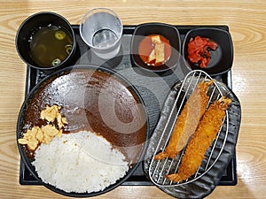 Hot and spicy curry rice lunch set with shrimp Tonkatsu and Kimchi and onion soup