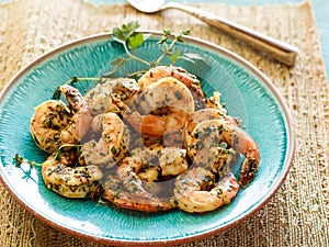 Hot spicy grilled Shrimp Scampi on plate in restaurant