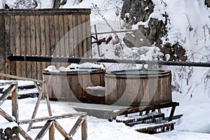 Hot springs georhemal water in mountains in winter. Vat with hot geothermal water in Medeo gorge, Gorelnik hot springs