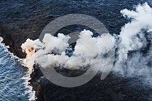 Hot steam clouds rise into the air over Hawaii