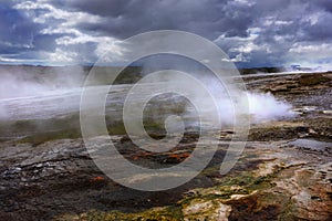 Hot steam over the source of the thermal waters, Hveravellir, Iceland. White nights in Iceland.