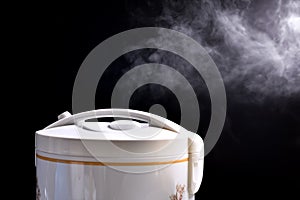 Hot steam and smoke floating beautiful rice cookers.