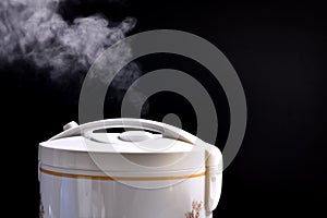 Hot steam and smoke floating beautiful rice cookers.