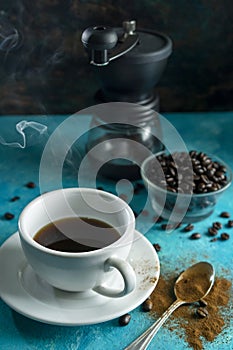 Hot steaming cup of brewed coffee