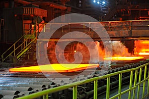 Hot steel on conveyor