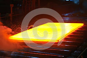 Hot steel on conveyor