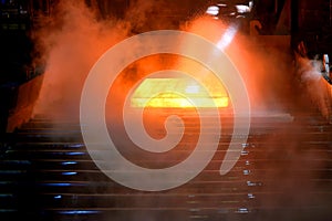 Hot steel on conveyor