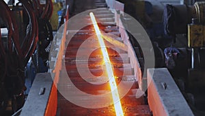 Hot steel pipe production line. Red hot metal pipe production process. Metallurgy. Hot Metal Tubes. Work Heavy Industry