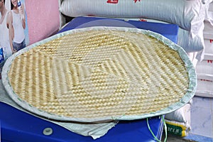 Hot sticky rice in old wooden steamer.