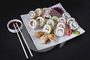 Hot sushi rolls table with gyoza