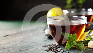 Hot tea cup with mint and sugar
