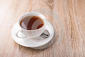 Hot tea cup with spoon