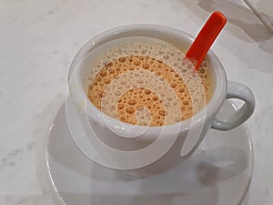 Hot tea with milk