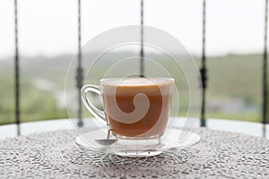 Hot thai tea on a cup