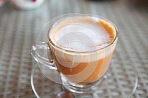 Hot thai tea on a cup