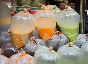 Hot thai tradition coffee, Hot thai tea, and Hot milk green tea in plastic bags for sale