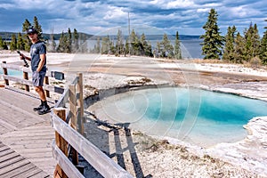 Hot thermal spring Abyss Pool in Yellowstone National Park, West Thumb Geyser Basin area, Wyoming, USA