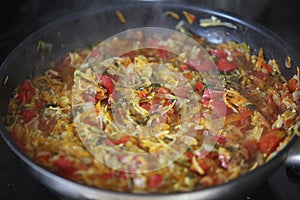 Hot vegetable stew in frying pan