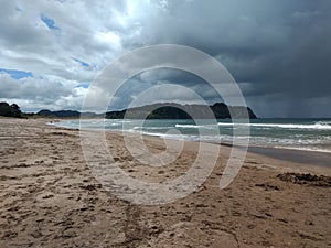 The hot water beach in the Coromandel, on a stormy day, New Zealand