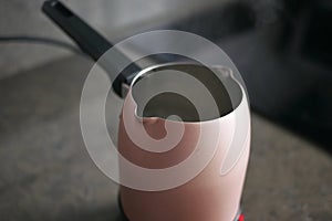 hot water in a jar on table