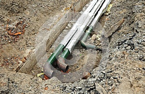 Hot water pipes repair and insulation for energy saving. Hot water pipeline.
