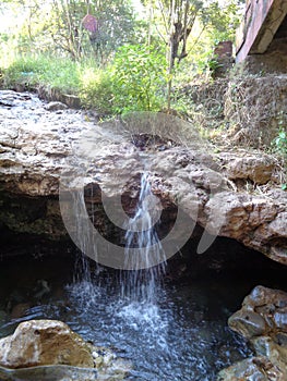 Hot Water Is Riding Soa Bajawa under the Bridge photo