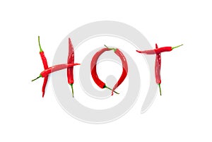 Hot word written with red chili peppers on white background abstract concept photo photo