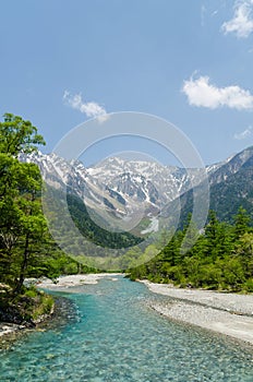 Hotaka mountain range and azusa river in spring at kamikochi japan