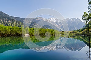 Hotaka mountain range reflect on taisho ike pond at nagano japan