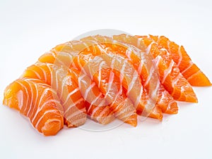 Hotate Sushi Roll and salmon and otoro sashimi with a white backdrop. Sushi with salmon and cucumber on a plate.?