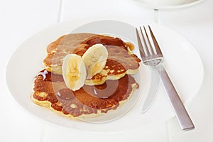 Hotcakes with Maple Syrup and Banana