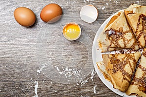 Hotcakes with syrup on plate photo