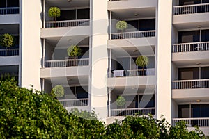 Hotel balconies decorated with small trees