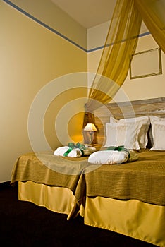 Hotel bedroom with drape