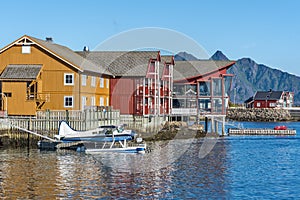 Hotel buildings in the islet of Lamholmen in the center of Svolvaer Town. Hydroplane and Waters of Vestfjord are at foreground.