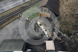 Hotel and coffee house near the train. Railway in the mountains