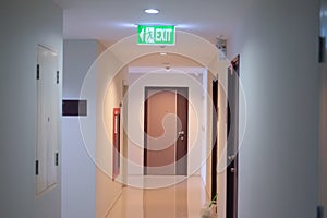 Hotel corridor to the fire exit door