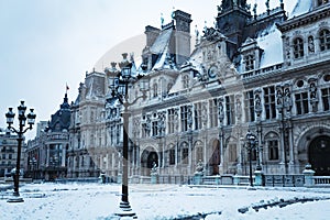 Hotel de Ville townhall square under snow in Paris